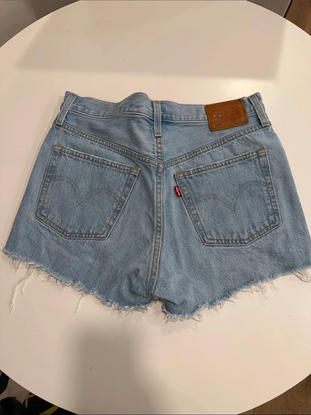 Levi’s 501 High-Rise Light Blue Distressed Denim Shorts